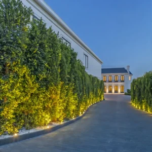 Jennifer Lopaze and Ben Affleck beverly Hills House entrance flanked by stately trees